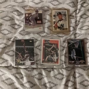 Two unique Derek Jeter cards and 3 nice Shaq cards